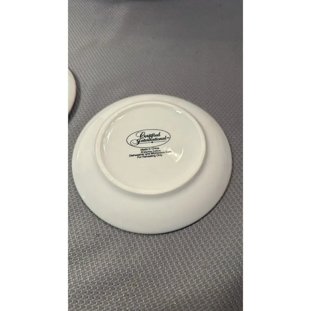 Set of 4 Certified International Ceramic Canapé Christmas plates 1 w/chip**